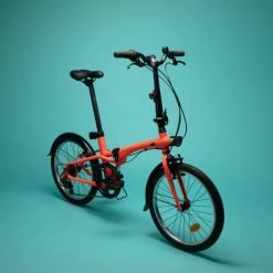 VELO PLIANT TILT 500 ORANGE FLUO 26 VELO PLIANT TILT 500 ORANGE FLUO -VÉLOS VTT Soldes velo pliant tilt 500 orange fluo 1 1 600x600 1